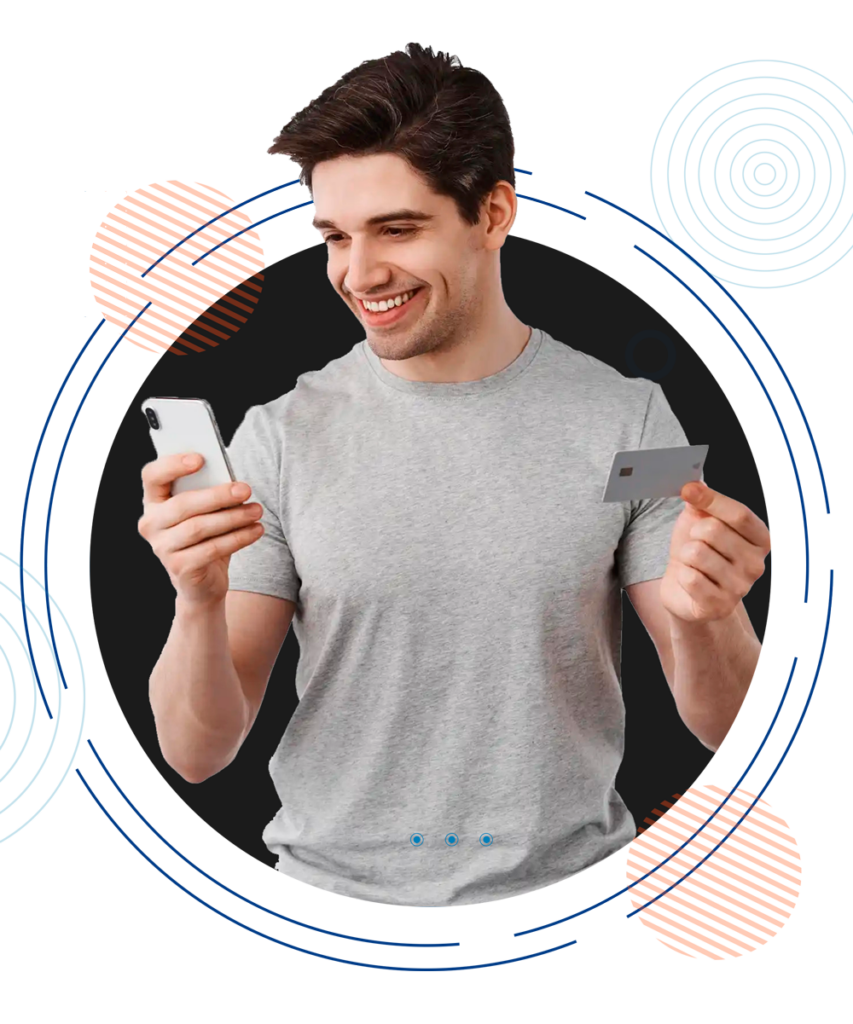 A man holding his Phone and Credit card